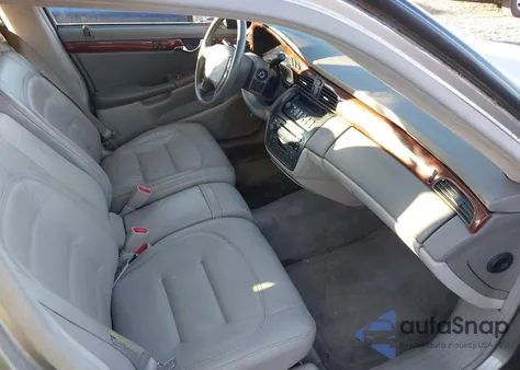 2003 Cadillac Deville Standard z USA, uszkodzony, nr VIN 1G6KD54YX3U142169